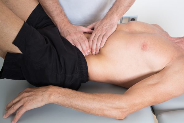 Neuromuscular treatment of the abdominals